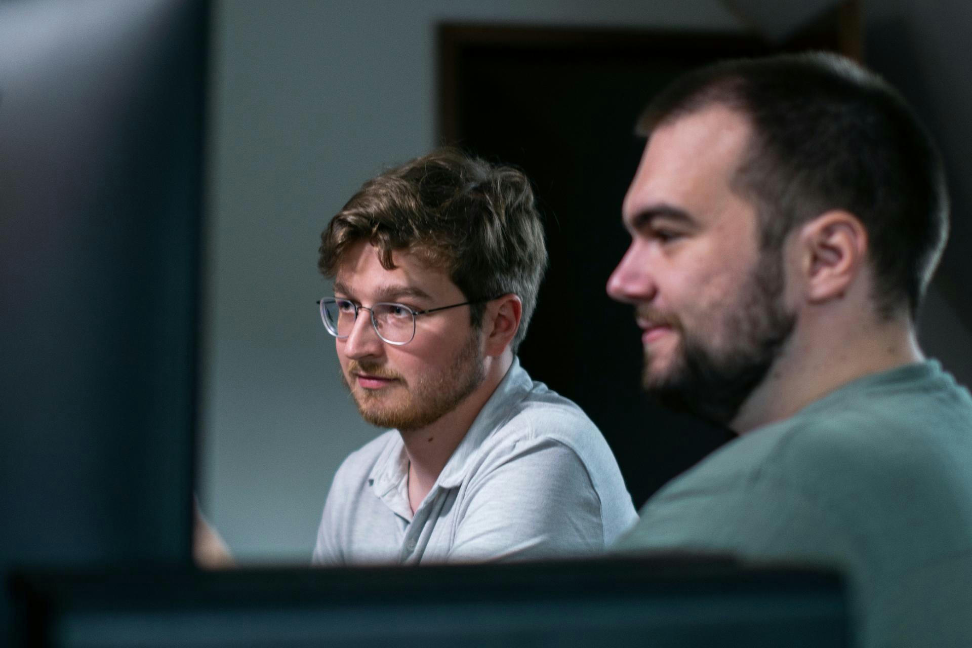 Software developers writing code